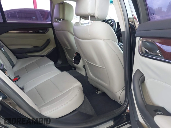 2014 Cadillac CTS RWD with VIN 1G6AP5SX4E0149156, listed as a IAAI auction lot 42681914 with 49,539 mi miles and . Bid and sale history available at DreamBid. Image 8.