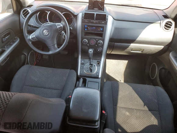 2012 Suzuki Grand Vitara Premium с VIN JS3TE0D62C4100130, выставлен на аукционе Copart как лот 48662145 с пробегом 81 557 миль миль и Списание • Salvage title. История ставок и продаж доступна на DreamBid. Изображение 8.