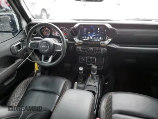 2023 Jeep Wrangler Sahara z VIN 1C4HJXEG9PW544275, wystawiony jako Copart lot #59932585 z przebiegiem 21 382 mil mil oraz Szkoda całkowita • Salvage title. Historia ofert i sprzedaży dostępna na DreamBid. Obrazek 8.