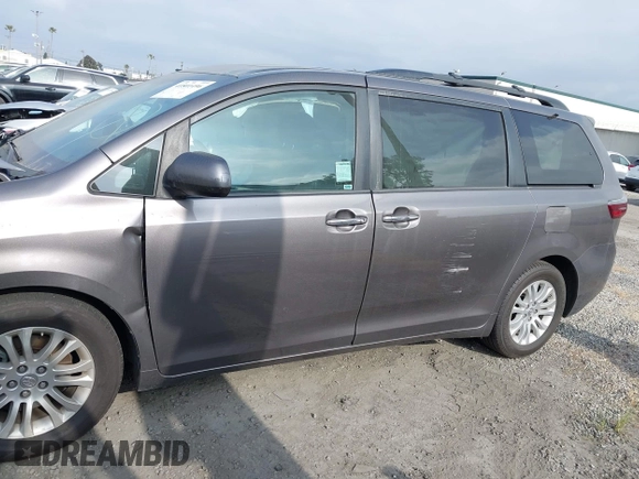 2015 Toyota Sienna XLE with VIN 5TDYK3DC6FS660410, listed as a IAAI auction lot 41801496 with 81,755 mi miles. Bid and sale history available at carsss.com. Image 15.
