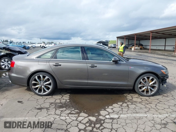 2013 Audi A6 Premium Plus z VIN WAUGGAFC8DN077982, wystawiony jako IAAI lot #41783832 z przebiegiem 95 981 mil mil oraz . Historia ofert i sprzedaży dostępna na DreamBid. Obrazek 14.