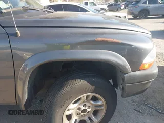 2003 Dodge Dakota SLT with VIN 1D7HG48N33S248568, listed as a IAAI auction lot 41834084 with 153,001 mi miles and . Bid and sale history available at DreamBid. Image 6.