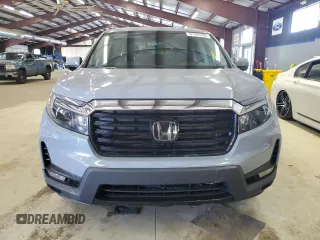 2023 Honda Ridgeline RTL-E with VIN 5FPYK3F77PB001460, listed as a Copart auction lot 61383785 with 27,423 mi miles and Salvage title. Bid and sale history available at DreamBid. Image 5.