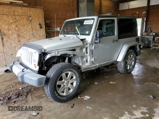 2012 Jeep Wrangler Arctic with VIN 1C4GJWBG2CL237343, listed as a Copart auction lot 64674015 with 72,750 mi miles and Salvage title. Bid and sale history available at DreamBid. Image 1.
