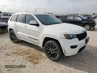 2018 Jeep Grand Cherokee Altitude with VIN 1C4RJEAG1JC397392, listed as a Copart auction lot 58214815 with 118,390 mi miles and Salvage title. Bid and sale history available at DreamBid. Image 4.