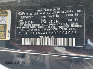 2013 Kia Optima LX with VIN 5XXGM4A72DG094053, listed as a IAAI auction lot 42095069 with 141,409 mi miles. Bid and sale history available at carsss.com. Image 9.