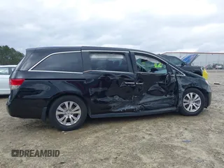 2016 Honda Odyssey EX-L with VIN 5FNRL5H64GB165341, listed as a IAAI auction lot 41728724 with 93,611 mi miles. Bid and sale history available at carsss.com. Image 13.