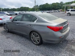 2014 Infiniti Q50 Hybrid Premium with VIN JN1AV7AP3EM690274, listed as a IAAI auction lot 42364775 with 123,315 mi miles and . Bid and sale history available at DreamBid. Image 3.