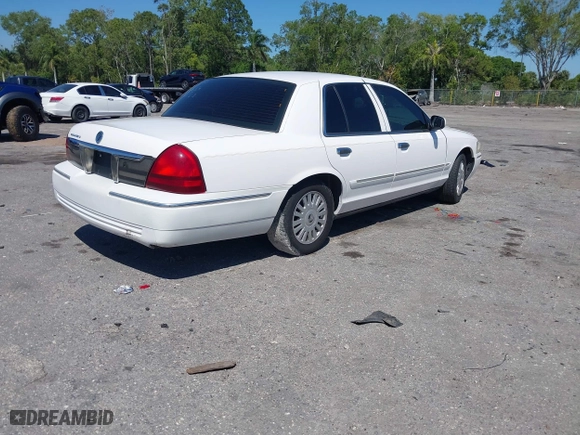 2007 Mercury Grand Marquis LS with VIN 2MEFM75VX7X623356, listed as a IAAI auction lot 41783361 with 157,921 mi miles. Bid and sale history available at carsss.com. Image 4.