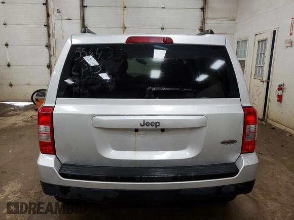 2012 Jeep Patriot with VIN 1C4NJPAB5CD558435, listed as a Copart auction lot 69703064 with 218,420 mi miles and Clean title. Bid and sale history available at DreamBid. Image 6.