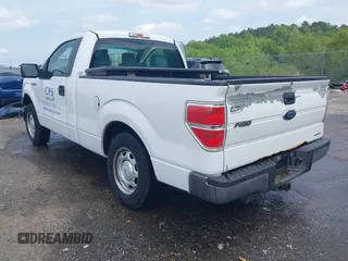 2014 Ford F-150 XL with VIN 1FTMF1CM1EKG31209, listed as a IAAI auction lot 42105573 with 187,162 mi miles and . Bid and sale history available at DreamBid. Image 3.