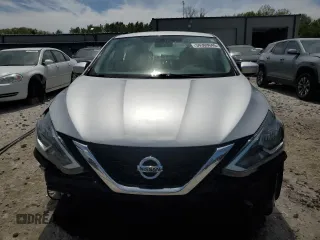 2019 Nissan Sentra S z VIN 3N1AB7AP8KY309049, wystawiony jako Copart lot #56308045 z przebiegiem 143 815 mil mil oraz Szkoda całkowita • Salvage title. Historia ofert i sprzedaży dostępna na DreamBid. Obrazek 5.
