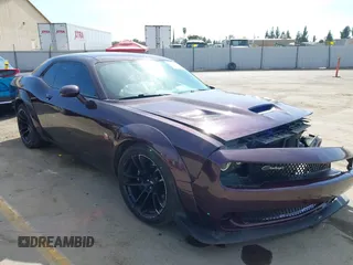 2021 Dodge Challenger R/T Scat Pack z VIN 2C3CDZFJ9MH654202, wystawiony jako IAAI lot #40729785 z przebiegiem 32 746 mil mil oraz . Historia ofert i sprzedaży dostępna na DreamBid. Obrazek 1.