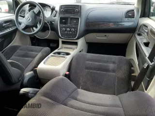 2014 Dodge Grand Caravan SXT z VIN 2C4RDGCG1ER214411, wystawiony jako Copart lot #55497065 z przebiegiem 176 662 mil mil oraz Czysty tytuł • Clean title. Historia ofert i sprzedaży dostępna na DreamBid. Obrazek 8.