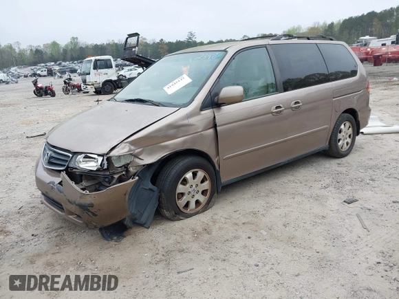 2004 Honda Odyssey EX with VIN 5FNRL18684B072343, listed as a IAAI auction lot 41945142 with 222,990 mi miles and . Bid and sale history available at DreamBid. Image 2.