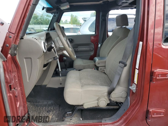 2008 Jeep Wrangler Unlimited Sahara with VIN 1J4GA59128L623399, listed as a Copart auction lot 56524545 with 219,096 mi miles and Clean Title. Bid and sale history available at DreamBid. Image 7.