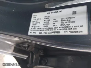 2023 Tesla Model 3 with VIN 5YJ3E1EA0PF577869, listed as a IAAI auction lot 41468956 with 38,760 mi miles. Bid and sale history available at carsss.com. Image 9.
