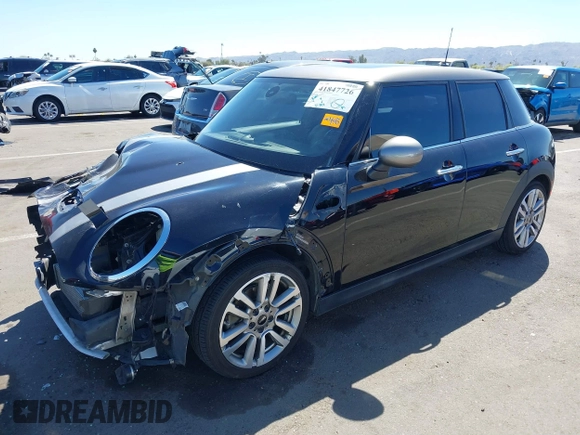 2017 MINI Hardtop 4 Door Cooper S z VIN WMWXU3C56H2D33072, wystawiony jako IAAI lot #41847726 z przebiegiem 81 783 mil mil oraz . Historia ofert i sprzedaży dostępna na DreamBid. Obrazek 2.