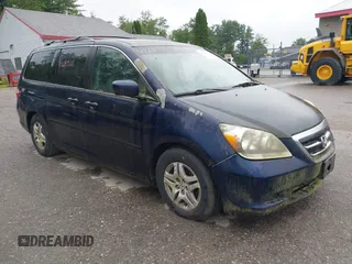 2005 Honda Odyssey EX-L with VIN 5FNRL38725B001662, listed as a IAAI auction lot 42693301 with 161,114 mi miles and . Bid and sale history available at DreamBid. Image 1.