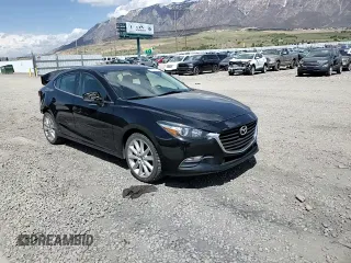 2017 Mazda 3 Touring z VIN 3MZBN1V79HM124716, wystawiony jako Copart lot #54564155 z przebiegiem 80 625 mil mil oraz Szkoda całkowita • Salvage title. Historia ofert i sprzedaży dostępna na DreamBid. Obrazek 14.