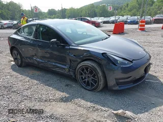 2023 Tesla Model 3 with VIN 5YJ3E1EA2PF566047, listed as a IAAI auction lot 42481008 with 21,143 mi miles and . Bid and sale history available at DreamBid. Image 1.