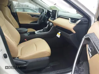 2023 Toyota RAV4 Hybrid XLE Premium with VIN JTMB6RFV4PD114763, listed as a IAAI auction lot 41766812 with 6,768 mi miles. Bid and sale history available at carsss.com. Image 5.