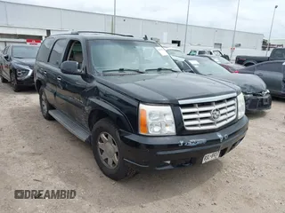 2006 Cadillac Escalade z VIN 1GYEC63N26R127189, wystawiony jako IAAI lot #42130224 z przebiegiem 242 694 mil mil oraz . Historia ofert i sprzedaży dostępna na DreamBid. Obrazek 1.