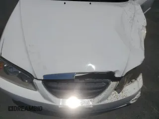 2006 Hyundai Elantra GLS с VIN KMHDN46D96U288604, выставлен на аукционе Copart как лот 58603915 с пробегом 92 518 миль миль и Списание • Salvage title. История ставок и продаж доступна на DreamBid. Изображение 11.