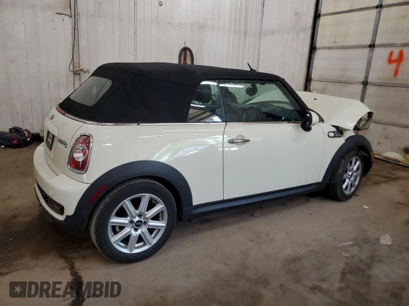 2015 MINI Convertible S с VIN WMWZP3C54F2A90956, выставлен на аукционе Copart как лот 57052545 с пробегом 39 096 миль миль и Списание • Salvage title. История ставок и продаж доступна на DreamBid. Изображение 3.