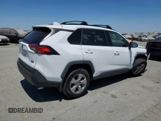 2022 Toyota RAV4 XLE with VIN 2T3W1RFV8NW233397, listed as a Copart auction lot 65276715 with 20,956 mi miles and Salvage title. Bid and sale history available at DreamBid. Image 3.