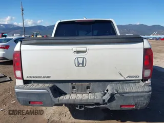2020 Honda Ridgeline RTL with VIN 5FPYK3F50LB028430, listed as a IAAI auction lot 42033090 with Not provided miles and . Bid and sale history available at DreamBid. Image 16.