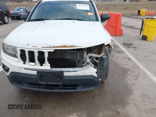 2016 Jeep Compass Sport with VIN 1C4NJDBB5GD804581, listed as a IAAI auction lot 41502976 with 196,351 mi miles and . Bid and sale history available at carsss.com. Image 18.