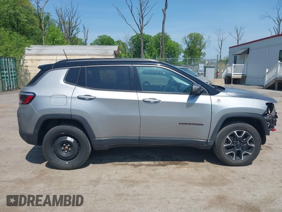 2021 Jeep Compass Trailhawk z VIN 3C4NJDDB7MT590390, wystawiony jako IAAI lot #42163205 z przebiegiem 70 551 mil mil oraz . Historia ofert i sprzedaży dostępna na DreamBid. Obrazek 14.