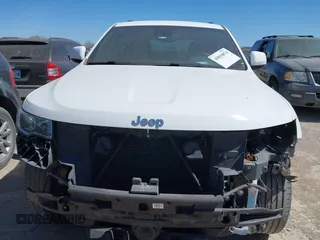 2021 Jeep Grand Cherokee Laredo E with VIN 1C4RJFAG5MC579865, listed as a IAAI auction lot 41818874 with 105,489 mi miles and . Bid and sale history available at DreamBid. Image 12.