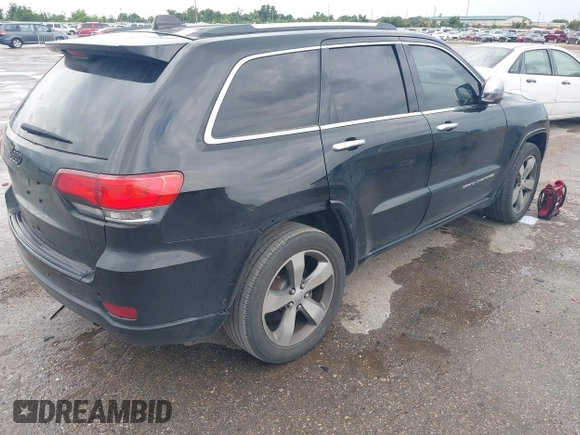 2015 Jeep Grand Cherokee Overland with VIN 1C4RJECG1FC769950, listed as a IAAI auction lot 42405712 with 217,514 mi miles and . Bid and sale history available at DreamBid. Image 4.