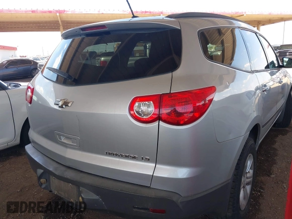 2012 Chevrolet Traverse LS z VIN 1GNKREED4CJ360370, wystawiony jako IAAI lot #42398695 z przebiegiem 194 875 mil mil oraz . Historia ofert i sprzedaży dostępna na DreamBid. Obrazek 4.