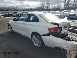 2015 BMW 2 Series 228i xDrive with VIN WBA1F7C58FV367269, listed as a Copart auction lot 87902715 with 67,151 mi miles and Salvage Title. Bid and sale history available at carsss.com. Image 2.