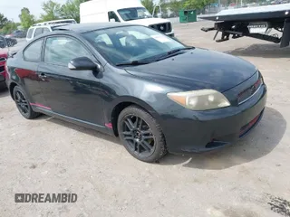 2007 Scion tC Spec with VIN JTKDE177270189720, listed as a IAAI auction lot 42091253 with 123,521 mi miles. Bid and sale history available at carsss.com. Image 1.