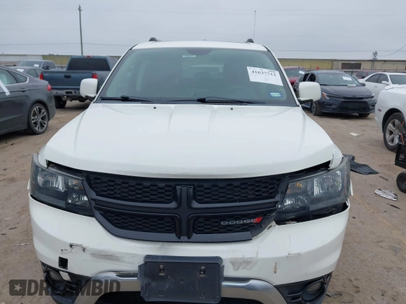 2016 Dodge Journey Crossroad Plus z VIN 3C4PDCGB9GT148592, wystawiony jako IAAI lot #41637712 z przebiegiem 145 662 mil mil oraz . Historia ofert i sprzedaży dostępna na DreamBid. Obrazek 12.
