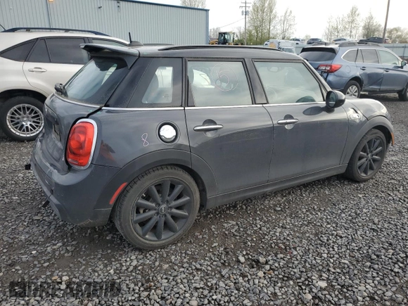 2016 MINI Hardtop 4 Door S with VIN WMWXU3C50G2B66741, listed as a Copart auction lot 52871335 with 53,653 mi miles and Salvage title. Bid and sale history available at DreamBid. Image 3.