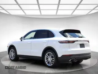 2021 Porsche Cayenne z VIN WP1AA2AY6MDA03XXX, wystawiony jako Copart lot #60909005 z przebiegiem 27 698 mil mil oraz Czysty tytuł • Clean title. Historia ofert i sprzedaży dostępna na DreamBid. Obrazek 3.