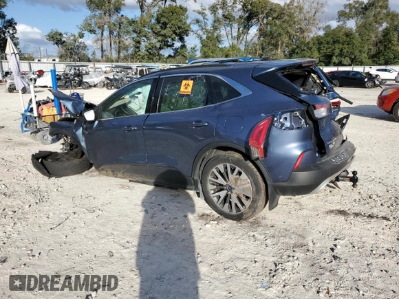 2020 Ford Escape Titanium Hybrid z VIN 1FMCU9DZ4LUC29367, wystawiony jako Copart lot #84709314 z przebiegiem Nie podano mil oraz Nie do naprawy • Non repairable. Historia ofert i sprzedaży dostępna na DreamBid. Obrazek 2.