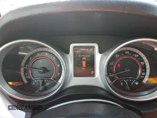 2014 Dodge Journey SXT with VIN 3C4PDCBG5ET126590, listed as a Copart auction lot 54770335 with 126,950 mi miles and Salvage Title. Bid and sale history available at DreamBid. Image 9.