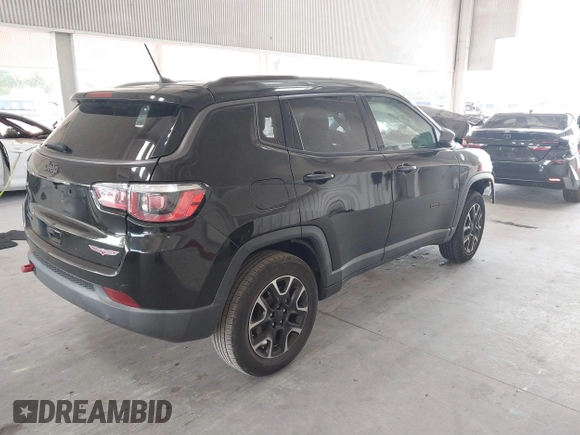 2020 Jeep Compass Trailhawk with VIN 3C4NJDDB3LT170463, listed as a IAAI auction lot 42446080 with 83,336 mi miles and . Bid and sale history available at DreamBid. Image 4.