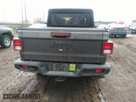 2021 Jeep Gladiator Sport S z VIN 1C6HJTAG3ML597041, wystawiony jako IAAI lot #41714640 z przebiegiem 46 402 mil mil oraz . Historia ofert i sprzedaży dostępna na DreamBid. Obrazek 16.