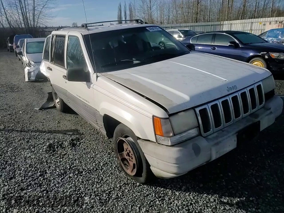 1996 Jeep Grand Cherokee Laredo with VIN 1J4EX58S3TC110154, listed as a Copart auction lot 46947805 with 268,507 mi miles and Salvage Title. Bid and sale history available at carsss.com. Image 12.