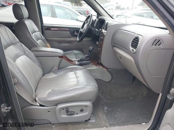 2003 GMC Envoy SLT with VIN 1GKDS13S232298062, listed as a IAAI auction lot 41668380 with 195,045 mi miles. Bid and sale history available at carsss.com. Image 5.