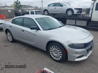 2019 Dodge Charger Police with VIN 2C3CDXKT1KH514640, listed as a IAAI auction lot 41975936 with 118,811 mi miles and . Bid and sale history available at DreamBid. Image 1.