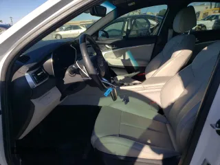 2022 Genesis G70 2.0T with VIN KMTG34TA6NU086756, listed as a Copart auction lot 83992224 with 23,858 mi miles and Salvage Title. Bid and sale history available at DreamBid. Image 7.