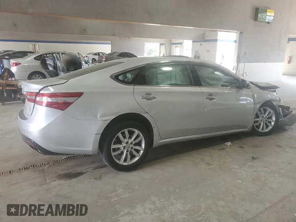 2013 Toyota Avalon XLE with VIN 4T1BK1EB0DU001291, listed as a Copart auction lot 54129175 with 107,242 mi miles and Salvage Title. Bid and sale history available at DreamBid. Image 3.